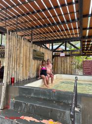 Bathing at hot springs.